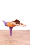 31942312 – woman doing yoga warrior 3 pose